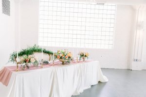 Romantic Elegant LGBTQ+ Wedding Reception Sweetheart Table Flowers Morgan Manufacturing Chicago