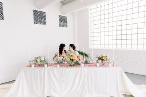 Romantic Elegant LGBTQ+ Wedding Reception Sweetheart Table Flowers Morgan Manufacturing Chicago
